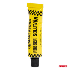 Dækreparationssæt med reparationsværktøj og lim