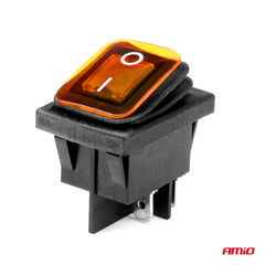 Black rectangular switch with yellow illumination